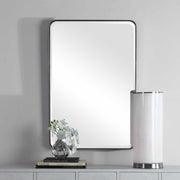 Silver wall mirror by Uttermost with a sleek, modern frame, perfect for contemporary interior decor.