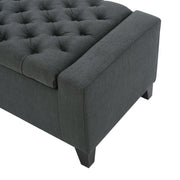 Dark gray Noble House contemporary storage ottoman with a tufted top, serving as a stylish and functional living room accent piece.