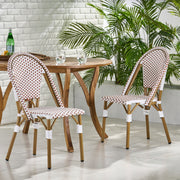 Set of four outdoor rattan and aluminum French bistro chairs by Noble House, featuring woven rattan seats and slender metal frames.