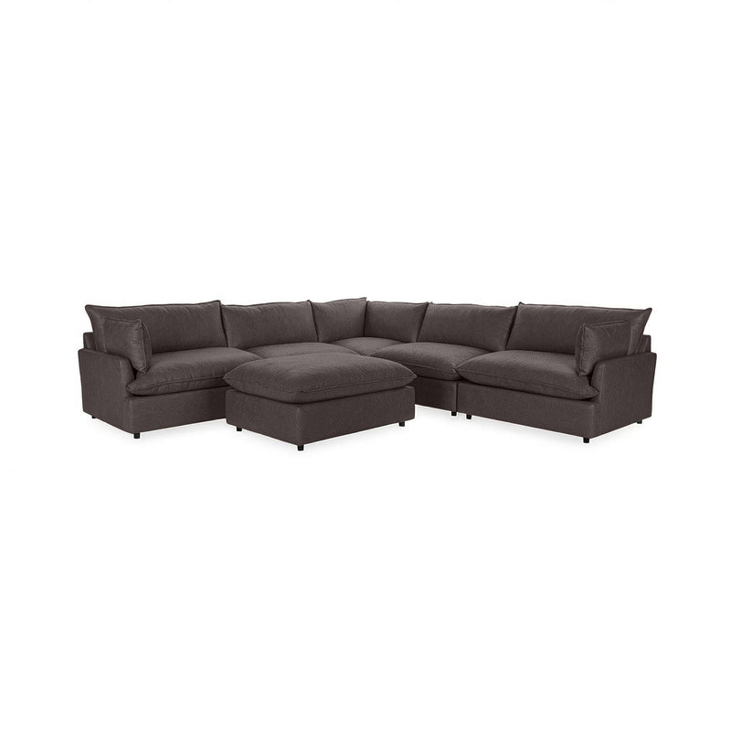 Classic Home Caplan 6-piece modular sectional with ottoman, shown as a stylish 2-piece living room set in a modern living space.