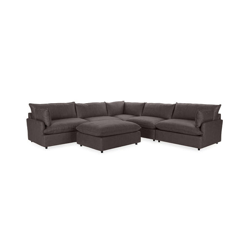 Classic Home Caplan 6-piece modular sectional with ottoman, shown as a stylish 2-piece living room set in a modern living space.