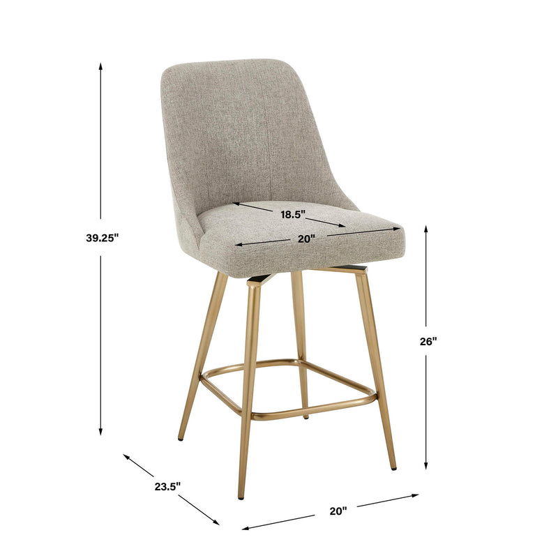 Upholstered gray and gold counter stool by Uttermost with a modern design and wooden legs, suitable for kitchen or bar area.