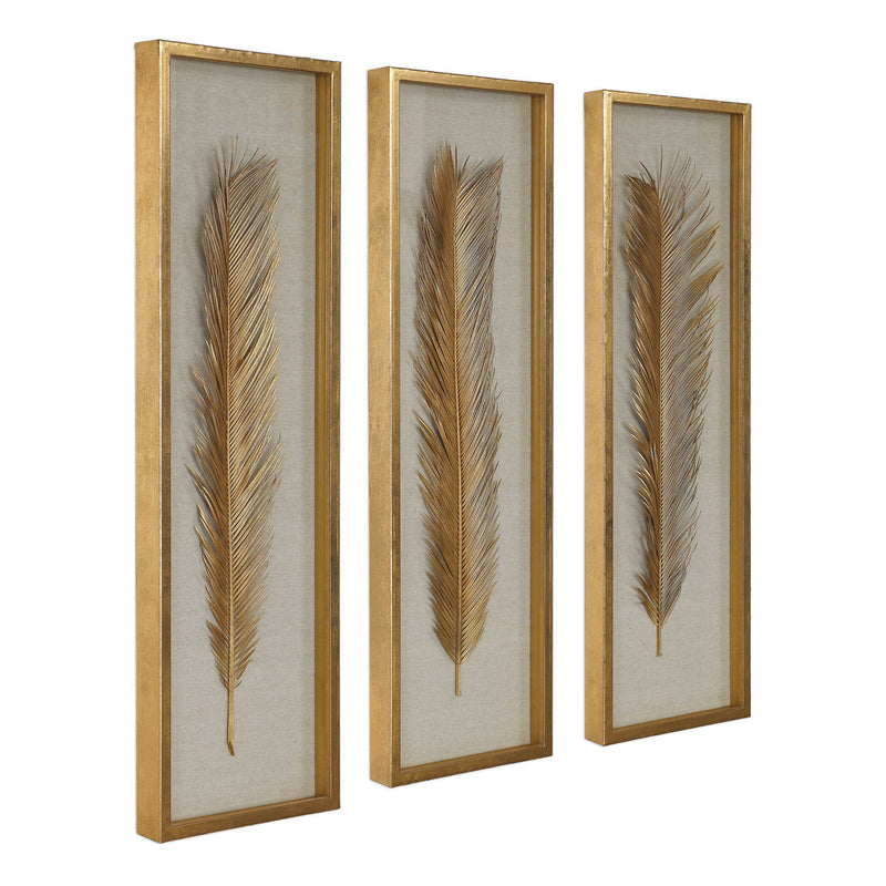 Set of three Uttermost Palma Leaf Shadow Box wall decor in gold, featuring intricate leaf designs for modern home accents.
