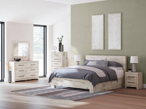 Benchcraft Lawroy 8+ piece storage bedroom set with bed frame, dresser, and nightstands in a modern bedroom setup.