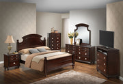 Hand-carved traditional panel bed from Glory Furniture featuring intricate wood details and a classic design.