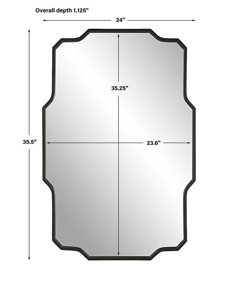 Uttermost Casmus black iron wall mirror with a sleek, modern round frame, mounted on a wall for stylish home decor.