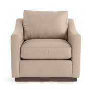 Classic Home Aspen accent arm chair with plush upholstery and wooden legs, featuring a stylish and comfortable design.