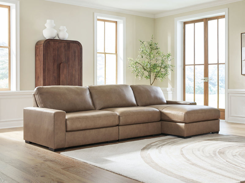Benchcraft Veronella stationary sectional sofa showing plush fabric cushions and modern design in a living room setting.