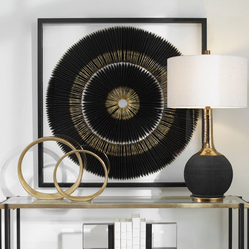Uttermost Sandara Shadow Box wall decor featuring a black and gold geometric design for modern interior decoration.