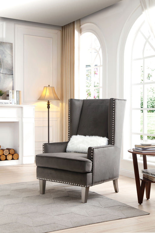 Elegant traditional accent arm chair by Glory Furniture with plush upholstery and carved wooden legs.