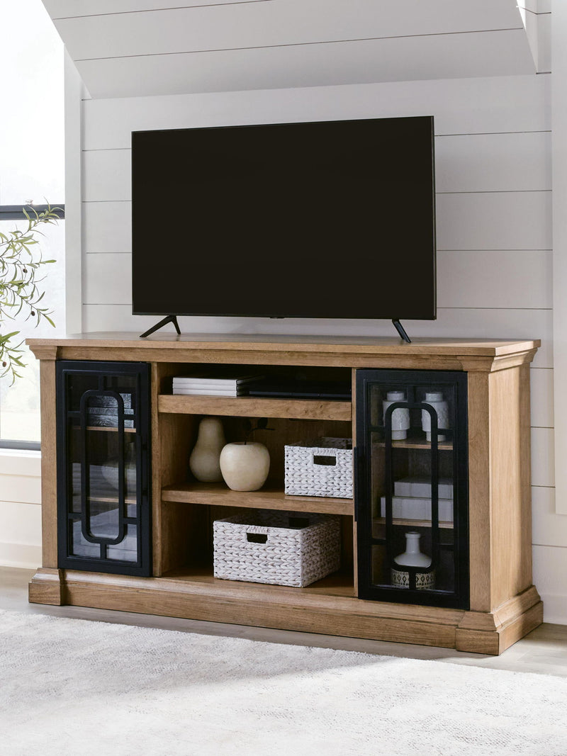 Signature Design by Ashley Wittenmyer TV stand with open shelves and storage compartments, crafted from dark wood.