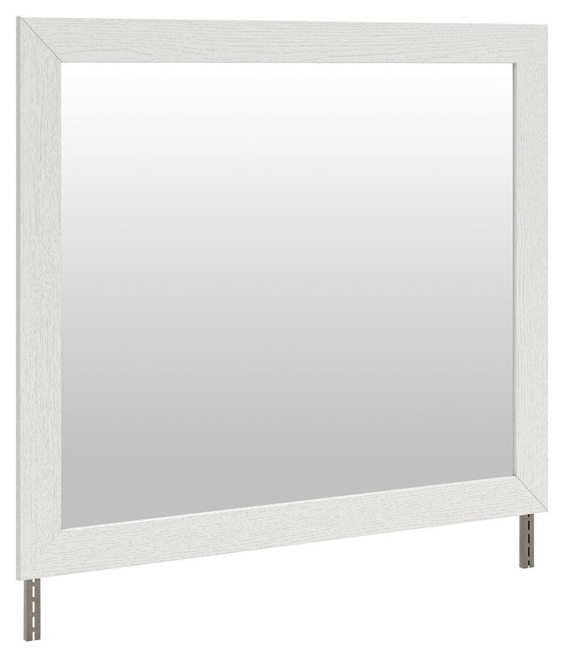 White Benchcraft® bedroom mirror by Savonport, modern rectangular mirror with clean lines, hangs on a wall in a bedroom setting.