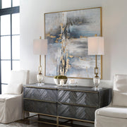 Blue abstract canvas art titled "Road Less Traveled" by Uttermost, featuring bold brushstrokes and textured design.