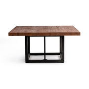 Messina dining table by Classic Home with a brown tabletop and black legs, stylishly set for a modern dining space.