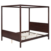 DreamHaus canopy platform bed with headboard, footboard, and slat support legs, showcasing sturdy wooden frame and elegant design.
