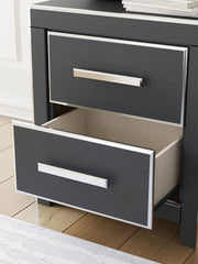 Zuraleus - Two Drawer Night Stand - R&R Furniture Gallery (Fountain Valley, CA)