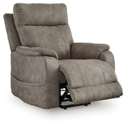 Signature Design by Ashley Crestmeade Power Lift Recliner with padded armrests and plush upholstery in a modern lift chair style.