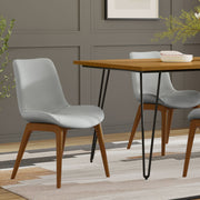 Set of two Simpli-Home Loretta upholstered dining chairs with padded seats and backrests in a modern design.