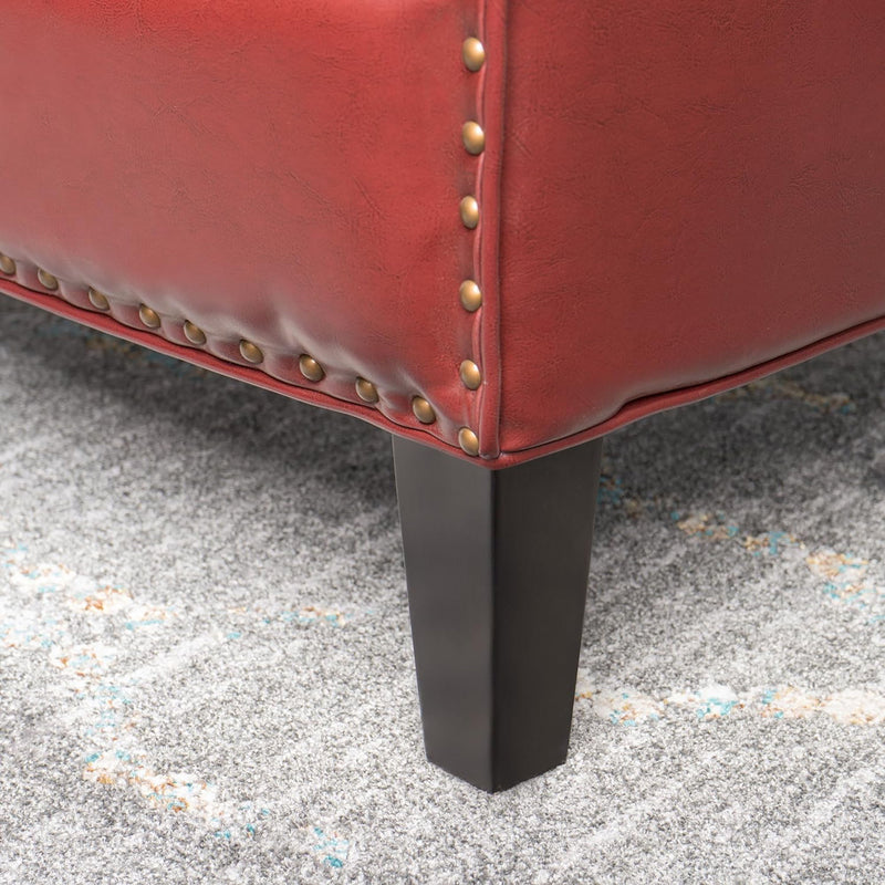 Noble House Enigmatica upholstered arm chair with nailhead trim, featuring plush cushioning and stylish design for living room decor.