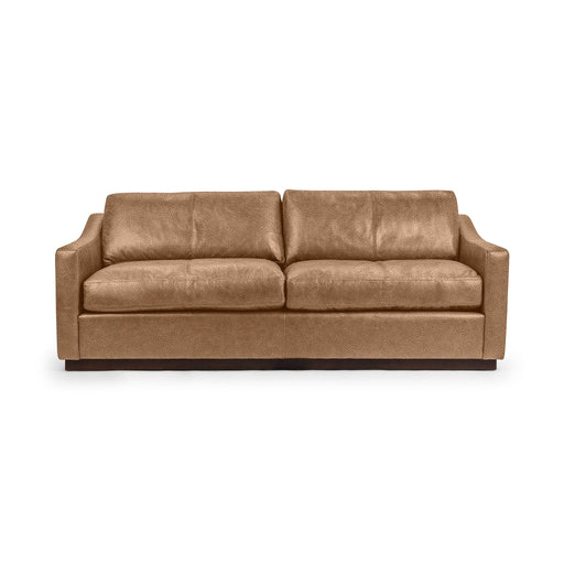 Classic Home Aspen stationary sofa with plush cushions and a modern design, shown in a cozy living room setting.