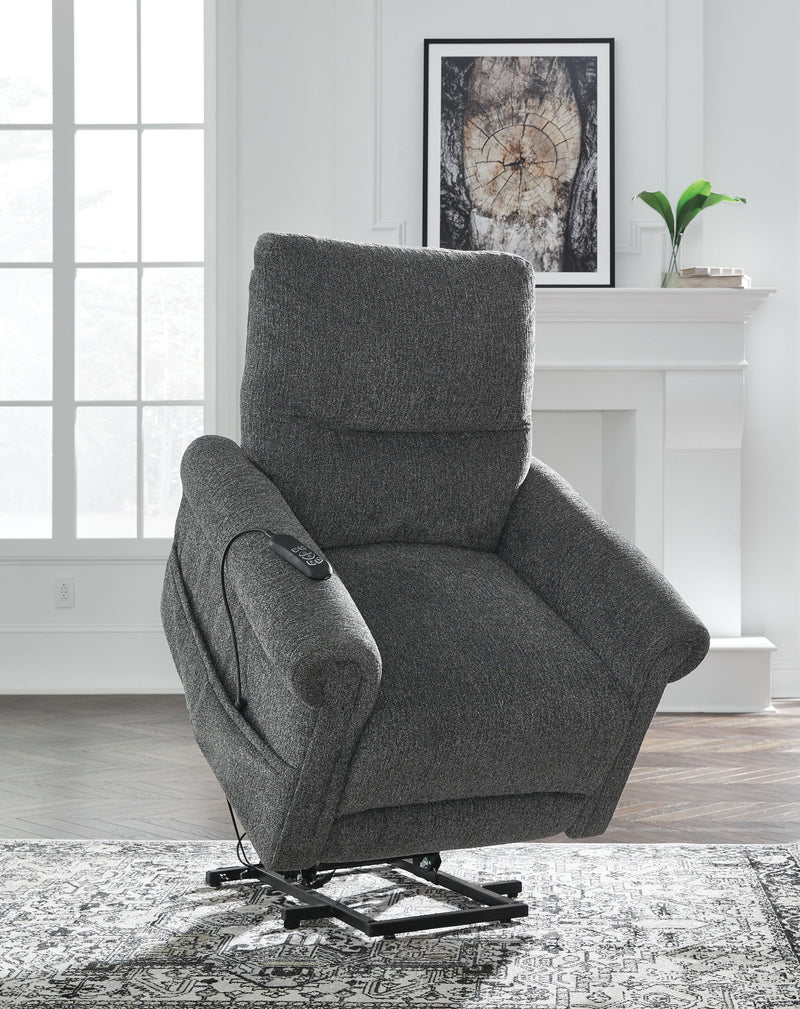 Signature Design by Ashley Aureta Power Lift Recliner in plush upholstery with padded armrests and built-in lift mechanism.