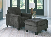 Benchcraft Erinslane living room set with stationary chair and matching ottoman, featuring plush upholstery and contemporary design.