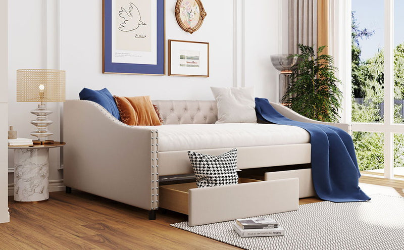 DreamHaus upholstered storage daybed with two drawers and wood slat support, featuring a cozy padded fabric design and sturdy frame.