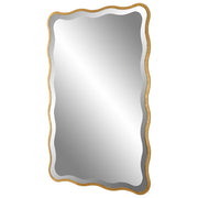 Gold Aneta scalloped accent mirror by Uttermost with a decorative, scalloped edge design.