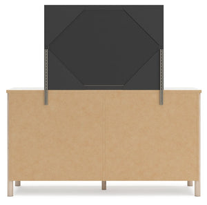 Signature Design by Ashley Cadmori Six Drawer Dresser with dark wood finish and sleek metal handles