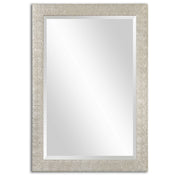 Antiqued silver wall mirror with ornate frame, vintage style, by Uttermost, perfect for adding elegant decor to a room.