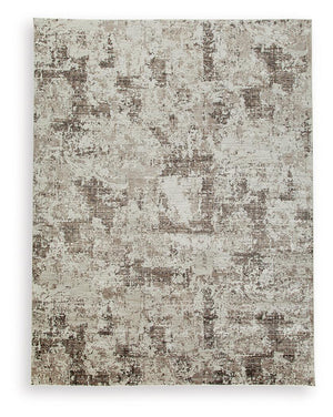 Signature Design by Ashley Barricland area rug with geometric pattern, soft texture, and neutral tones for modern home decor.