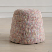Uttermost Gumdrop upholstered ottoman with plush fabric and rounded shape, perfect for living room or bedroom decor.