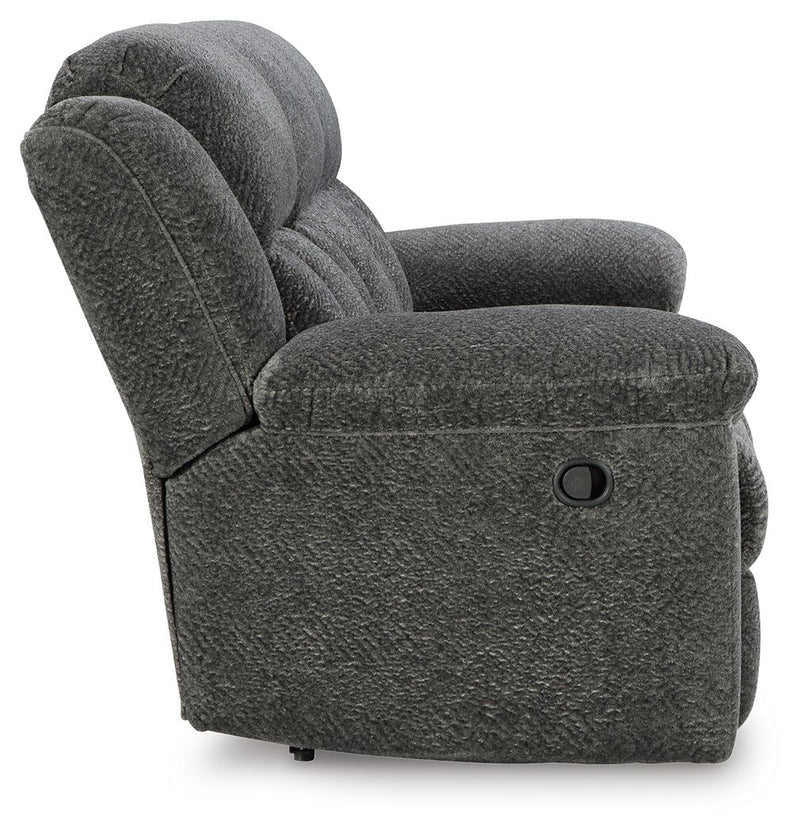 Signature Design by Ashley Frohn reclining sofa and loveseat set with plush upholstery and padded armrests, ideal for living room comfort.