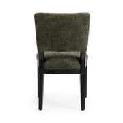 Pair of Classic Home Arima dining chairs with wooden legs and upholstered seats, shown in a modern dining room setting.