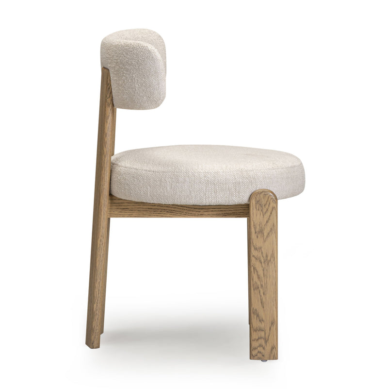 TOV Furniture Odessa dining side chair with upholstered seat and wooden legs, modern design for kitchen or dining room.