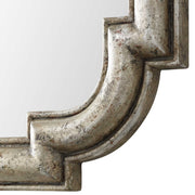 Uttermost Calanna wall mirror with antique silver finish, ornate frame design, reflecting a stylish decorative wall piece.
