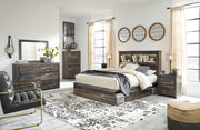 Signature Design by Ashley Drystan bookcase bed set with matching 8-piece bedroom furniture, including bed, dresser, and nightstands.