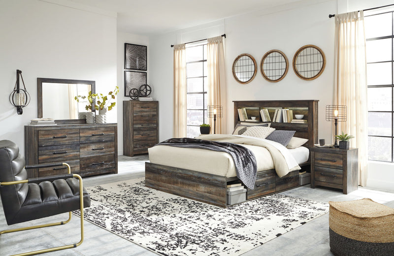Signature Design by Ashley Drystan bookcase bed set with matching 8-piece bedroom furniture, including bed, dresser, and nightstands.