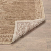 Classic Home Luxor Cairo hand-knotted rug with intricate geometric patterns in warm earthy tones.