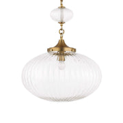 Uttermost Bellaire 1-light pendant with gold finish and glass shade hanging from a ceiling mount.