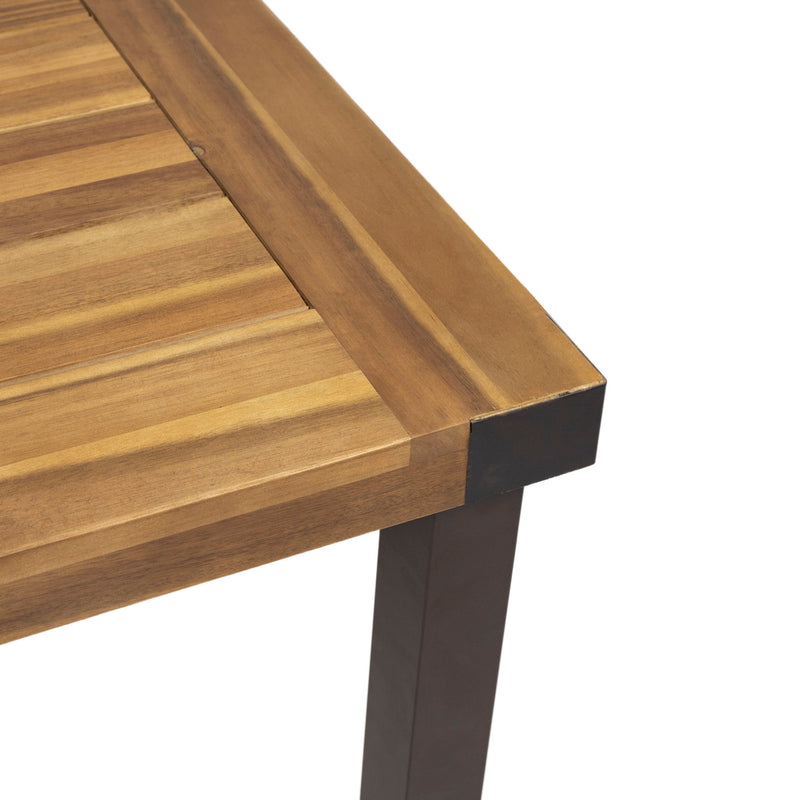 Modern industrial dining table by Noble House with acacia wood slat top in teak finish, perfect for contemporary dining rooms.