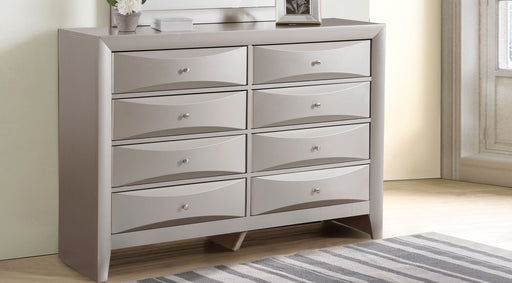 Glory Furniture Marilla dresser with four spacious drawers in a modern bedroom setting.