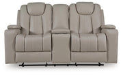 Signature Design by Ashley Elevate Edges Glide Reclining Loveseat with console, featuring plush cushions and textured fabric in coin color.