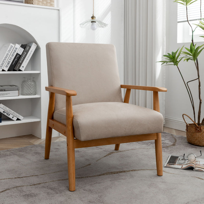 US Pride wide classic mid-century modern arm chair with wooden legs and upholstered beige fabric in a living room setting.
