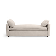 Classic Home Caplan backless sofa daybed with plush cushions and sleek wooden legs, ideal for modern living spaces.