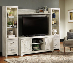 Bellaby entertainment center by Signature Design by Ashley with rustic wood finish and open shelving