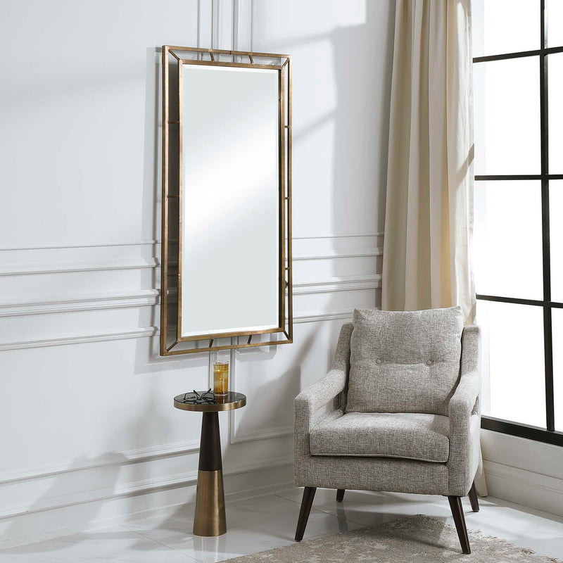 Farrow Copper Industrial Wall Mirror by Uttermost with a gold-finished round frame and vintage-inspired design.