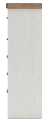 Benchcraft® Savonport five drawer chest in white and brown with sleek accent chest design and modern hardware.