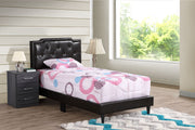 Upholstered tufted bed by Glory Furniture with button-tufted headboard, perfect for cozy bedroom spaces.