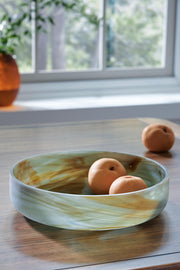 Sage green Bannington bowl from Signature Design by Ashley® with a smooth ceramic finish and rounded shape.